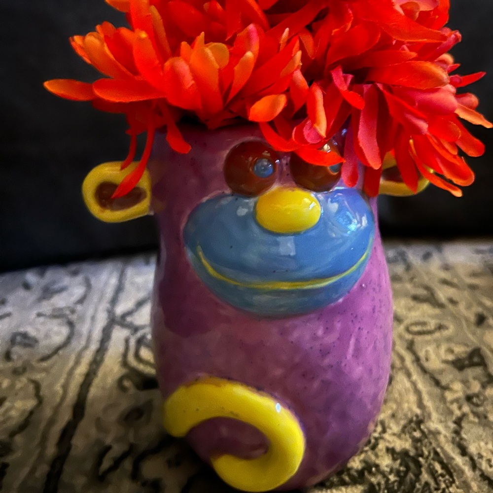 Ceramic monkey vase